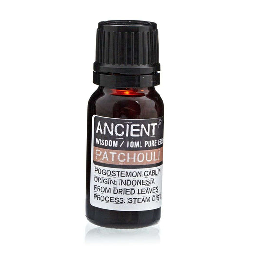 10 ml bottle of Patchouli Essential Oil with natural leaves background