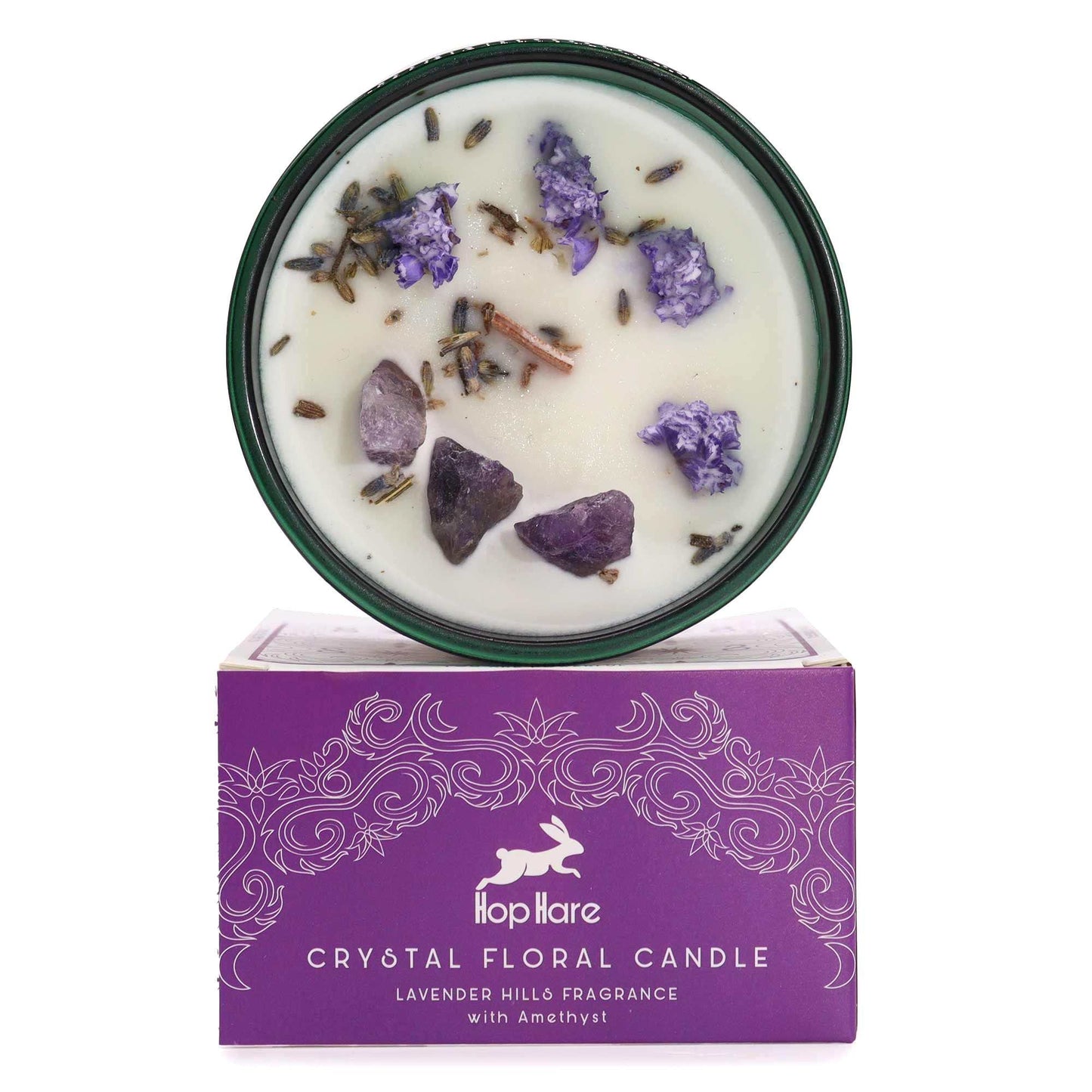 Hop Hare Crystal Magic Flower Candle The Moon with amethyst and lavender flowers burning on wooden surface