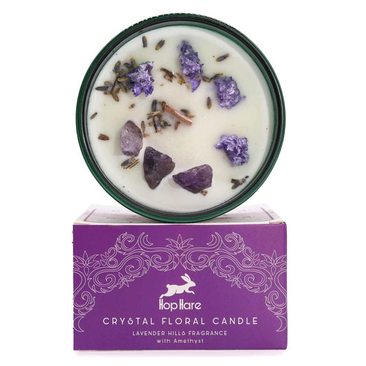 Hop Hare Crystal Magic Flower Candle The Moon with amethyst and lavender flowers burning on wooden surface